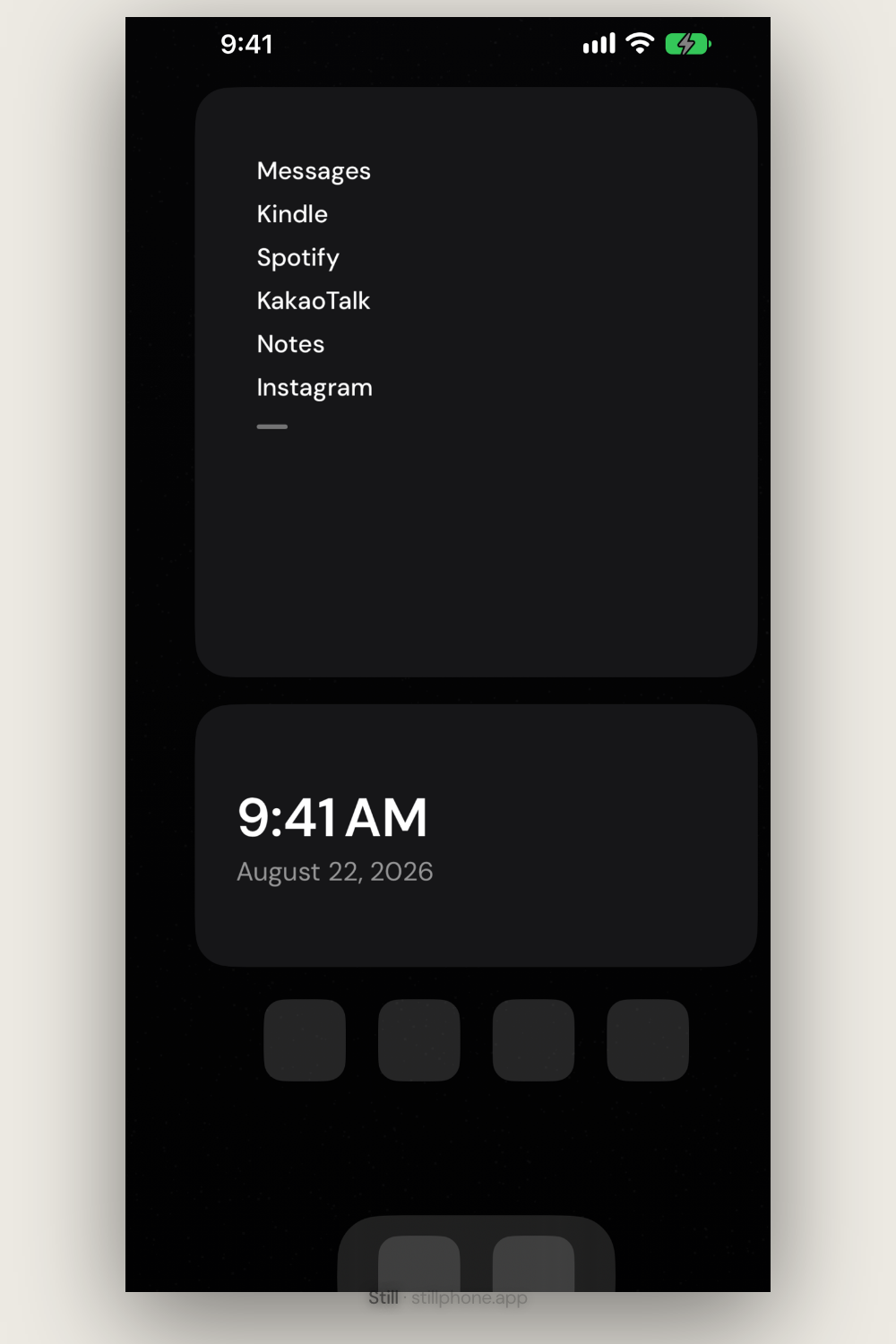 A Still home screen on an iPhone, dark widgets on a pale ground